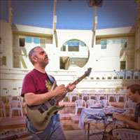 Mike Metlay rehearsing at Arcosanti, 2010 - East Crescent in the background
